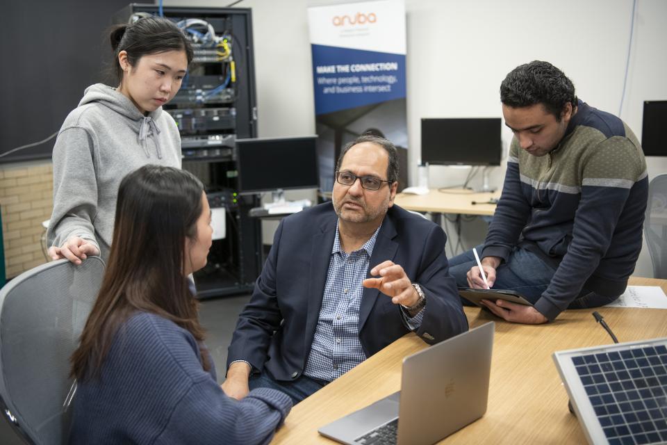 Ness Schoff teaches students